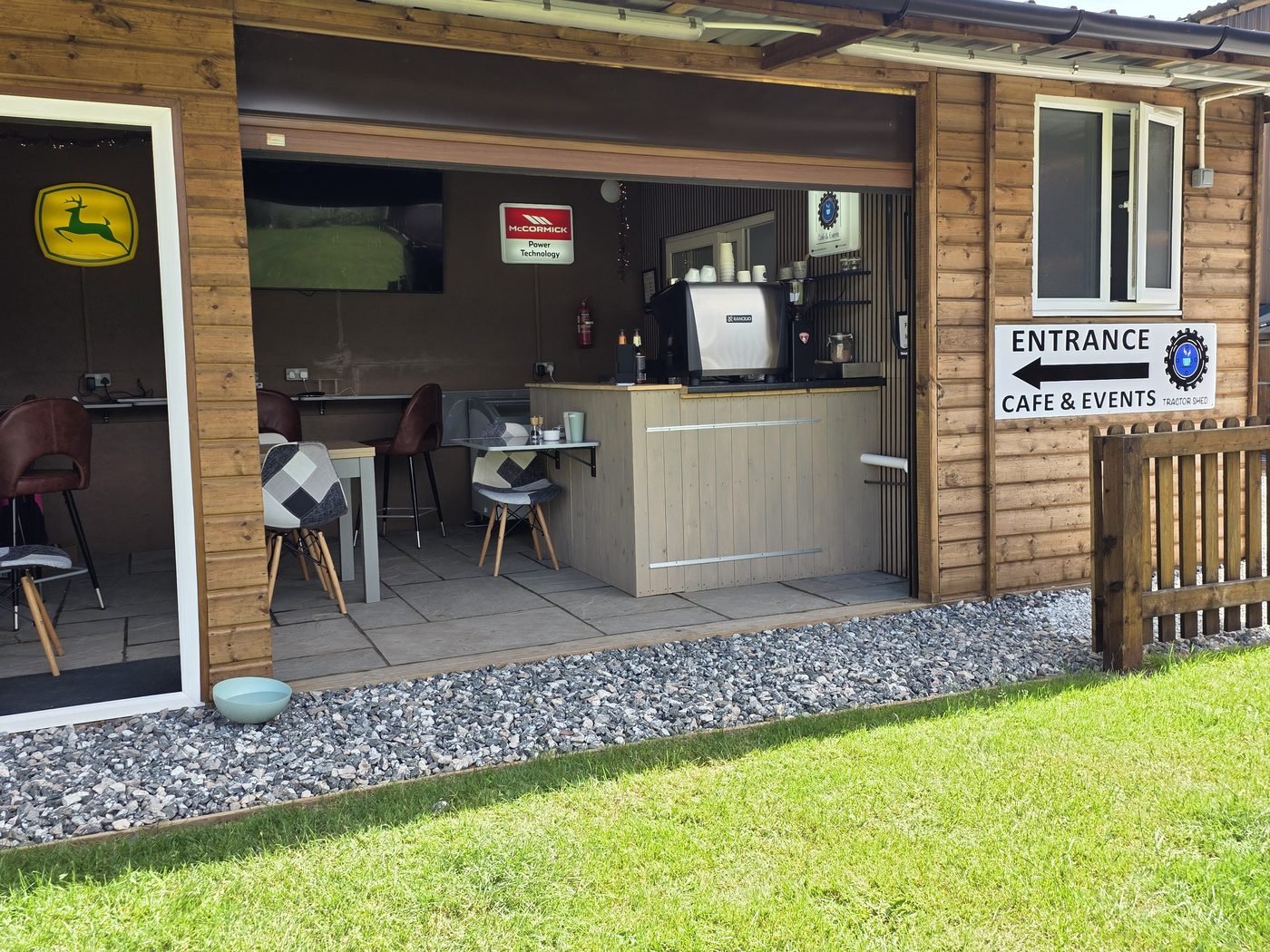 The Tractor Shed cafe entrance with seating just inside
